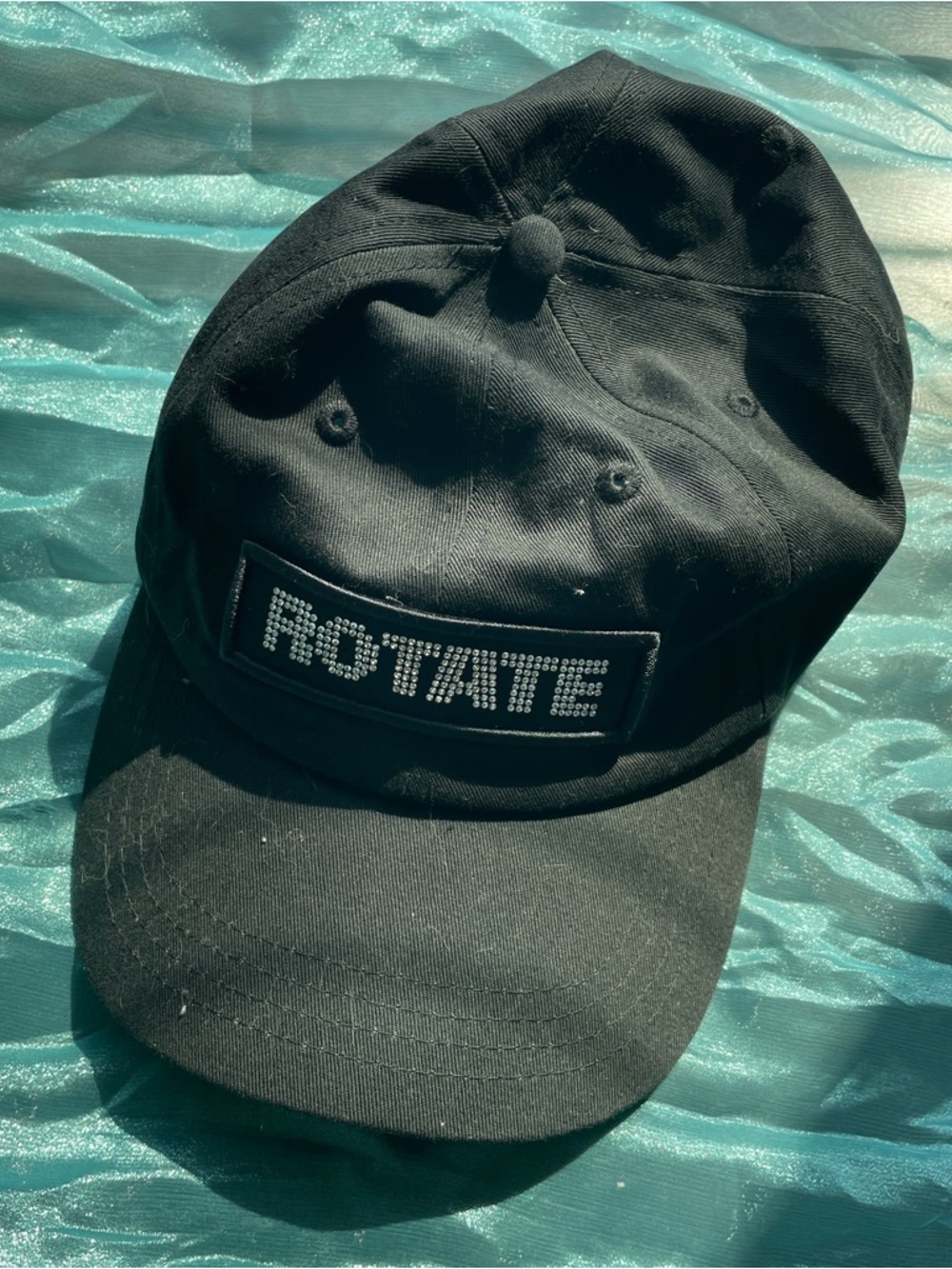 Black Baseball Cap with Rhinestone 'ROTATE' Patch